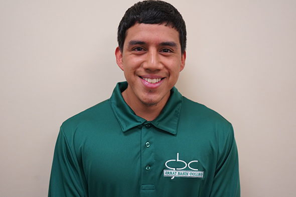 Oscar Gonzales-Ortiz Photograph of Oscar Gonzales-Ortiz in green GBC polo.